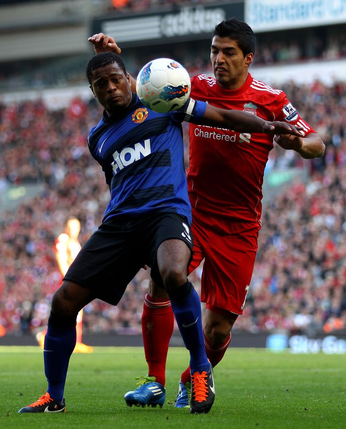 Suarez og Evra hittast á ný í febrúar.