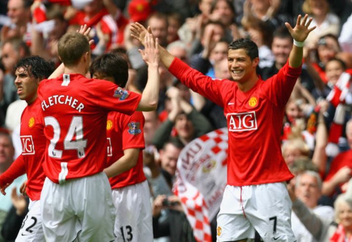 Cristiano Ronaldo fagnar marki í leik með Manchester United.
