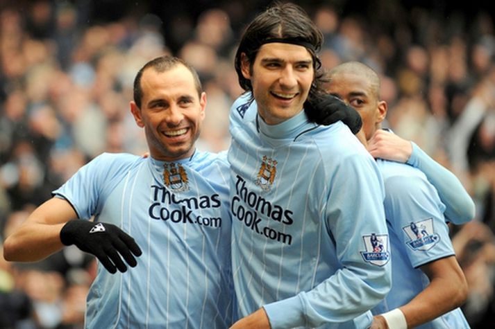 Leikmenn Manchester City fagna marki í vetur.