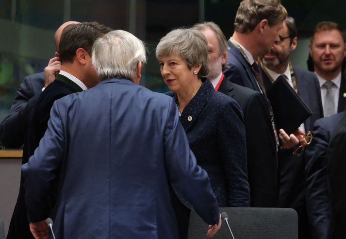 Theresa May, forsætisráðherra Bretlands, ræðir við Jean-Claude Juncker, forseta framkvæmdastjórnar ESB, í Brussel fyrr í dag.