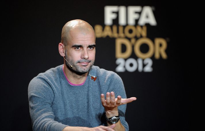 Guardiola ræðir við blaðamenn í dag.