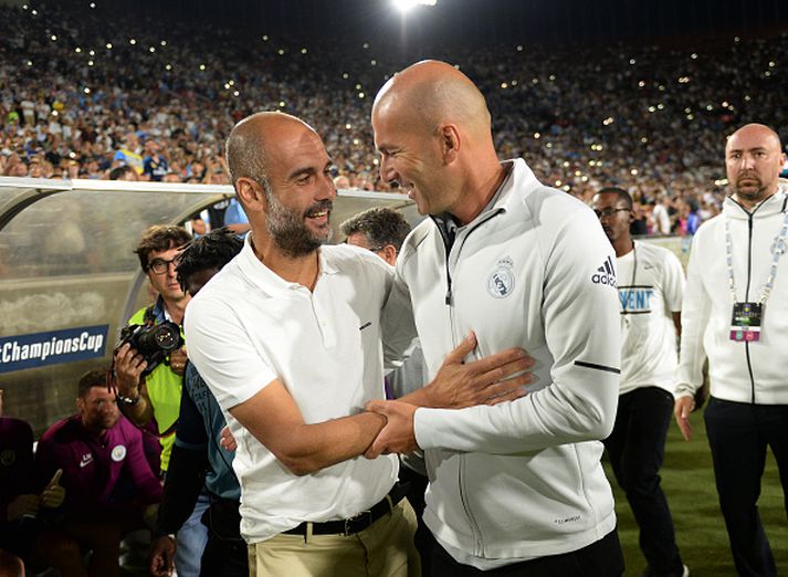 Guardiola og Zidane heilsa upp á hvorn annan fyrir æfingarleik City og Real árið 2017.