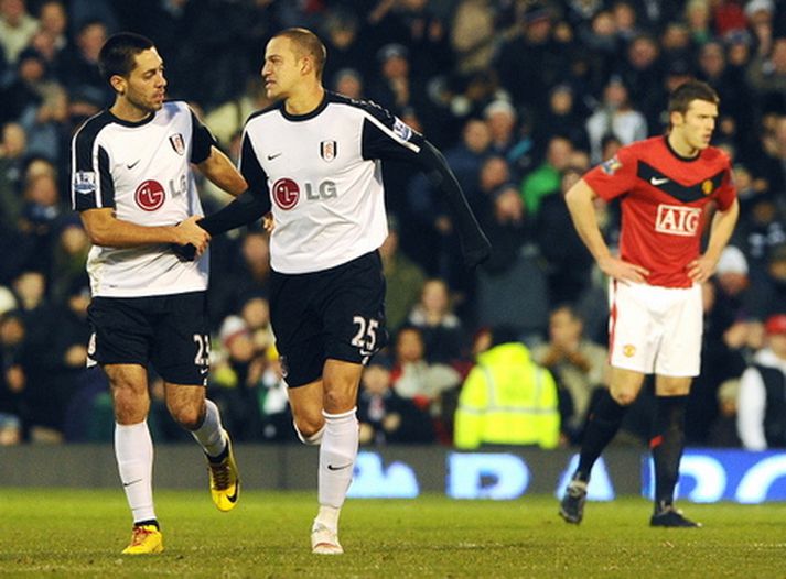 Bobby Zamora og Clint Dempsey fagna marki þess fyrrnefnda í dag.