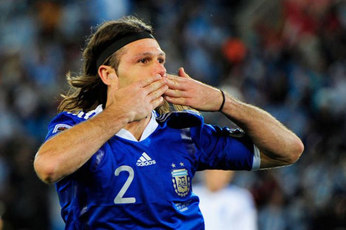 Martin Demichelis fagnar marki sínu í kvöld.