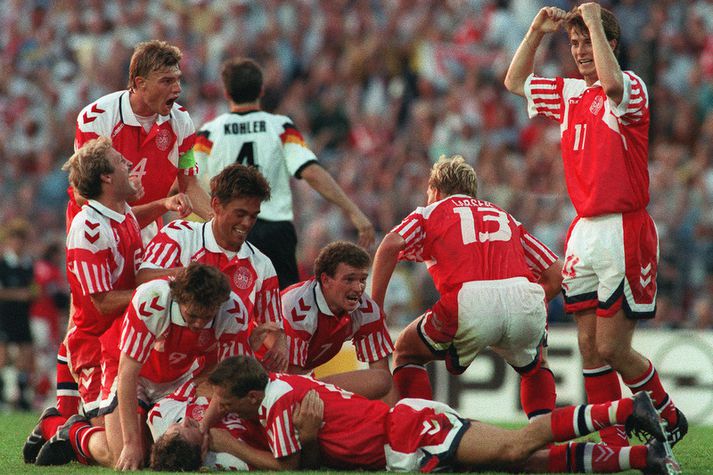 Danir fagna hér sigri á EM 1992.