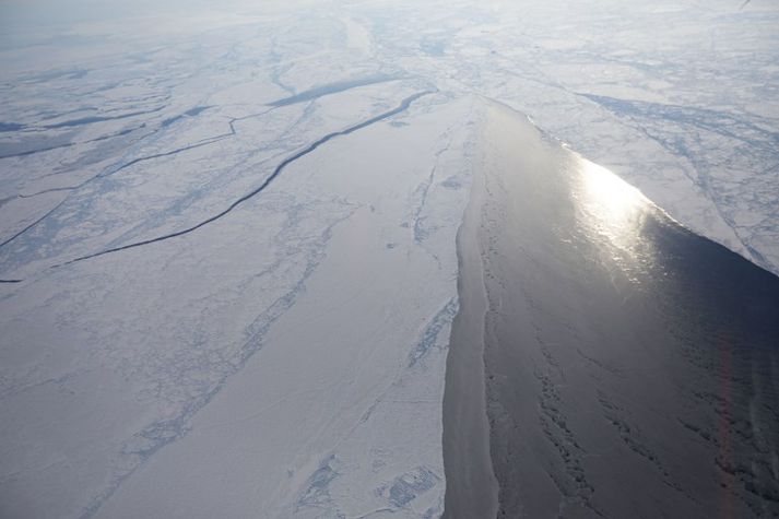 Hafís norðvestur af Grænlandi á mynd NASA frá því í mars í fyrra. Hámarksútbreiðsla íssins hefur aldrei mælst minni fyrir árstíma en þá.