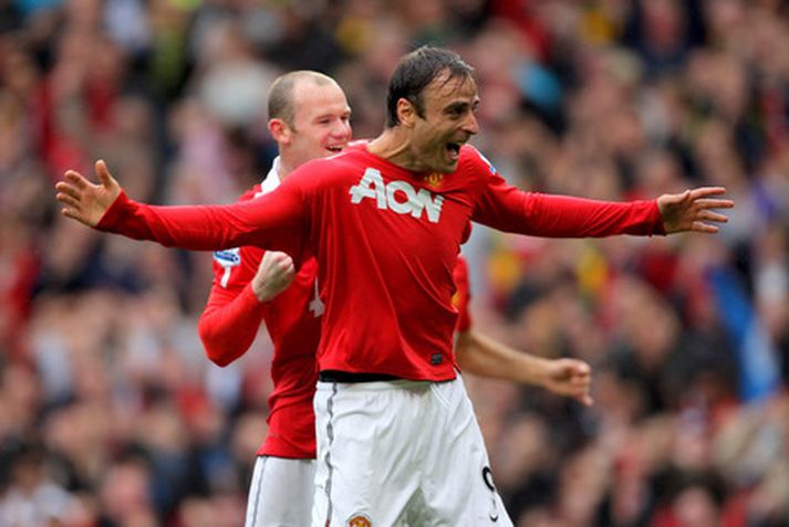 Dimitar Berbatov fagnar um helgina.