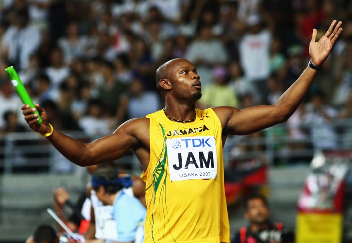 Asafa Powell bætti heimsmetið.