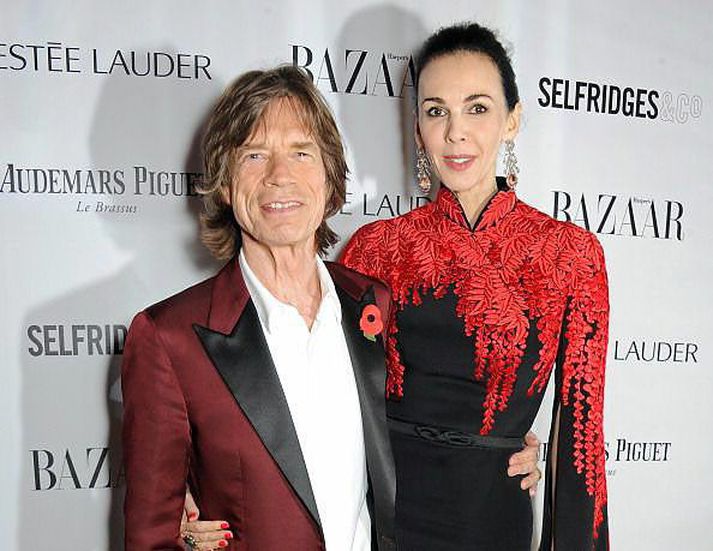 Mick Jagger og L'Wren Scott á rauða dreglinum en þau voru einkar glæsilegt par. Mick Jagger var staddur á tónleikaferðalagi í Ástralíu þegar honum bárust fréttirnar af andláti unnustu sinnar.