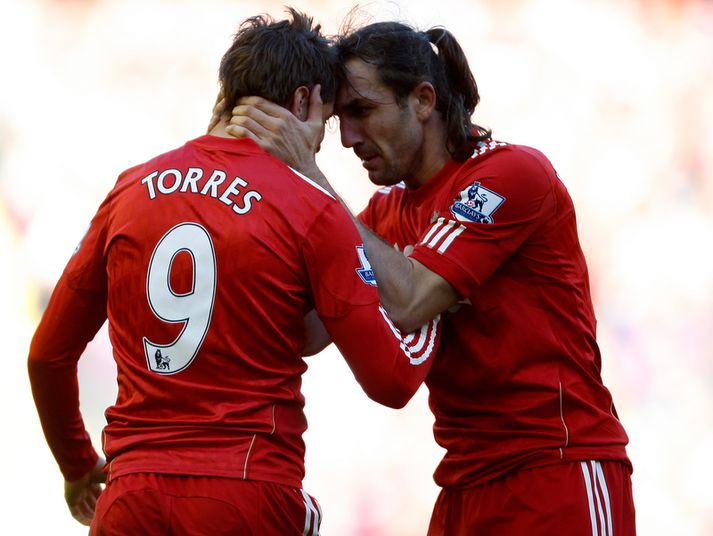 Fernando Torres og Sotirios Kyrgiakos.