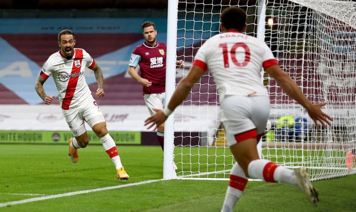 Burnley v Southampton - Premier League BURNLEY, ENGLAND - SEPTEMBER 26: Danny Ings (L) of Southampton celebrates with Ché Adams after opening the scoring during the Premier League match between Burnley and Southampton at Turf Moor on September 26, 2020 in Burnley, United Kingdom. Sporting stadiums around the UK remain under strict restrictions due to the Coronavirus Pandemic as Government social distancing laws prohibit fans inside venues resulting in games being played behind closed doors. (Photo by Matt Watson/Southampton FC via Getty Images)