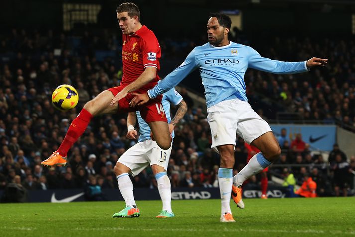 Jordan Henderson, miðjumaður Liverpool og Joleon Lescott, miðvörður Manchester City.