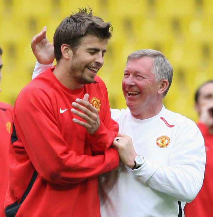 Pique ásamt Ferguson.