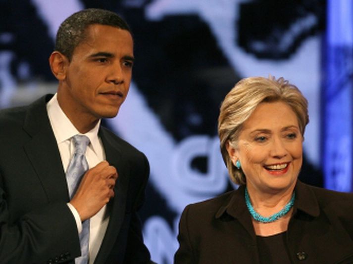 Clinton og Obama munu áfram takast á.