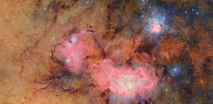 Trifid-stjörnuþokan (efri til hægri) og Lónsþokan í stjörnumerkinu bogmanninum í um níu þúsund ljósára fjarlægð frá jörðinni á mynd Veru C.Rubin-athuganastöðvarinnar.