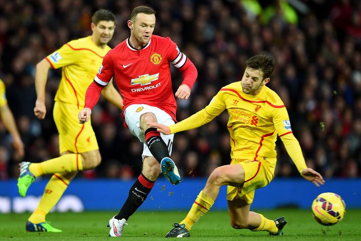 Wayne Rooney er auðvitað í liði Manchester United.