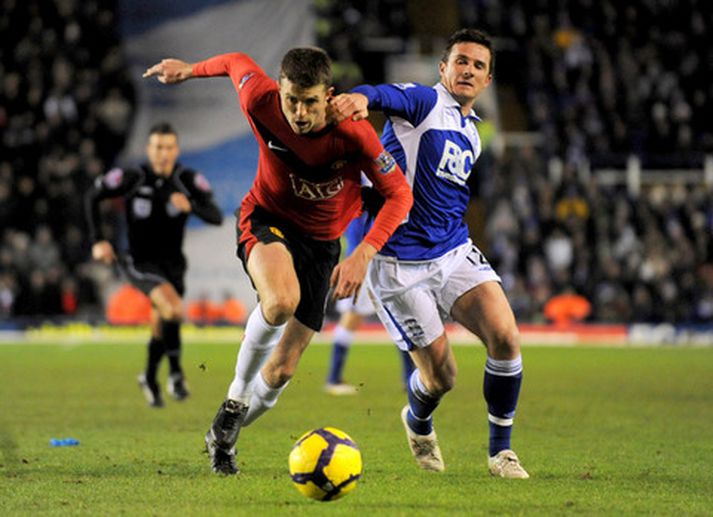 Michael Carrick og Barry Ferguson í baráttunni í dag.