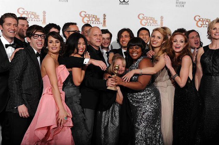 Glee-hópurinn fagnaði verðlaunum sínum innilega á Golden Globe-hátíðinni.
nordicphotos/getty