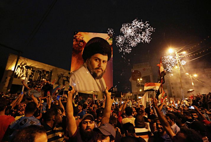 Stuðningsmenn al-Sadr fagna úrslitunum á götum Baghdad