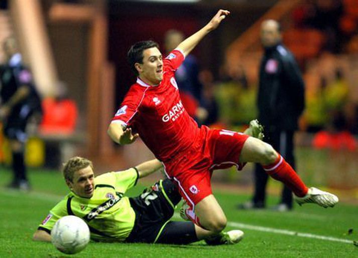 Stewart Downing í baráttunni.