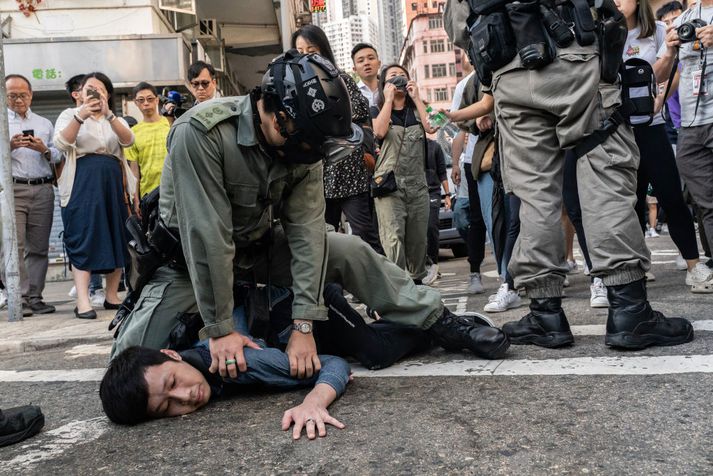 Frá óeirðunum í Hong Kong í morgun.