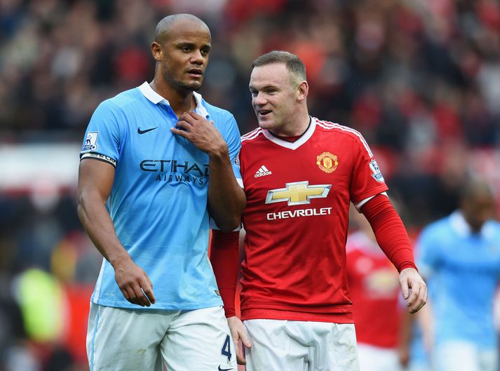 Wayne Rooney og Vincent Kompany, fyrirliði Manchester City.