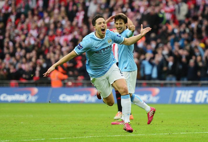 Nasri fagnar.