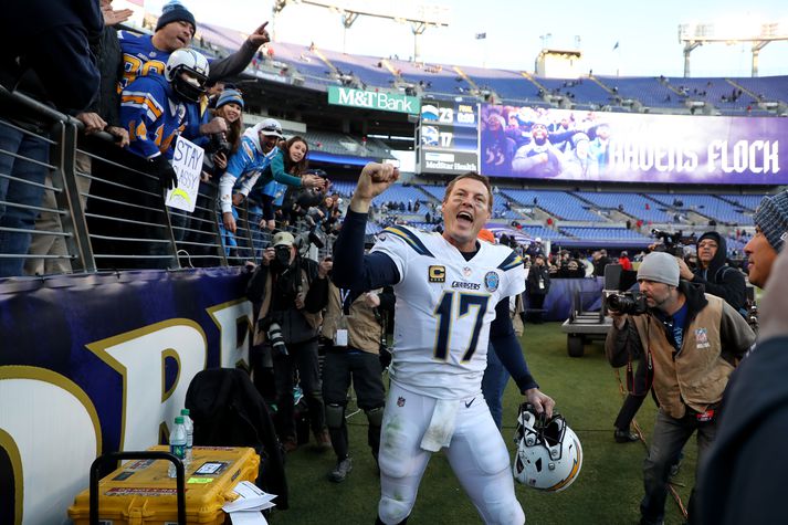 Philip Rivers fagnar sigri um síðustu helgi.