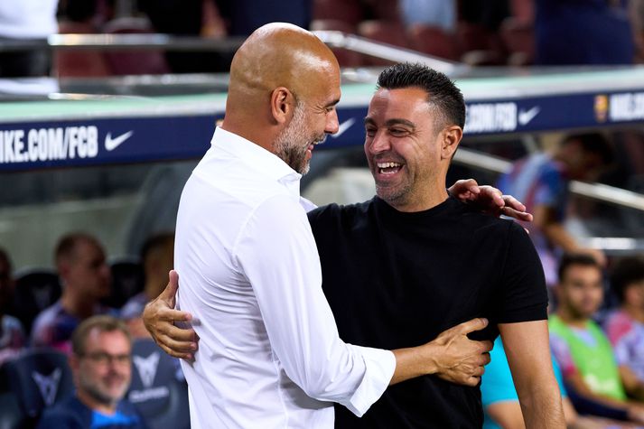 Pep Guardiola og Xavi Hernandez á góðri stundu.