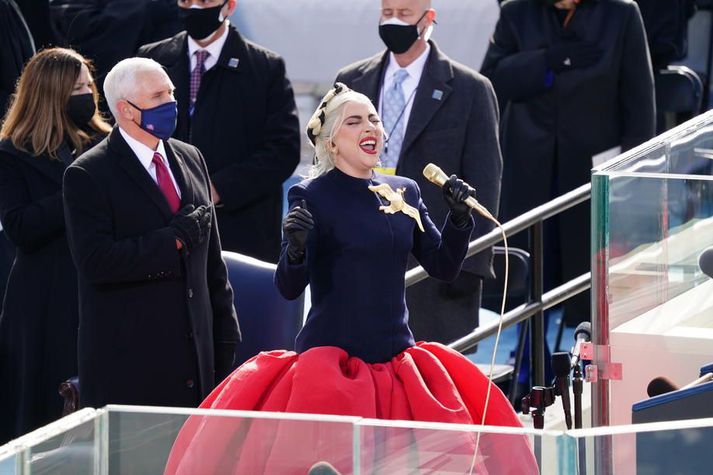 US Presidential inauguration 2021 epa08953314 Musician Lady Gaga sings the National Anthem during the inauguration of Joe Biden as US President in Washington, DC, USA, 20 January 2021. Biden won the 03 November 2020 election to become the 46th President of the United States of America. EPA-EFE/Kevin Dietsch / POOL