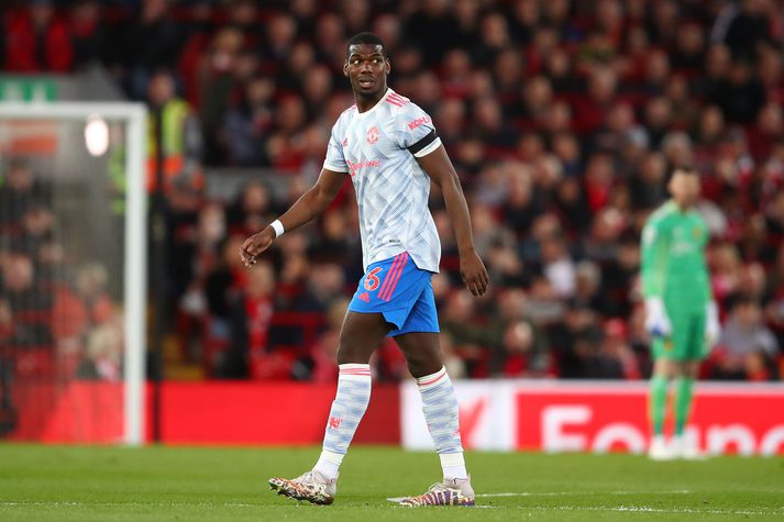 Paul Pogba gengur af velli í síðasta leik sínum fyrir Manchester United, 4-0 tapi fyrir Liverpool 19. apríl.