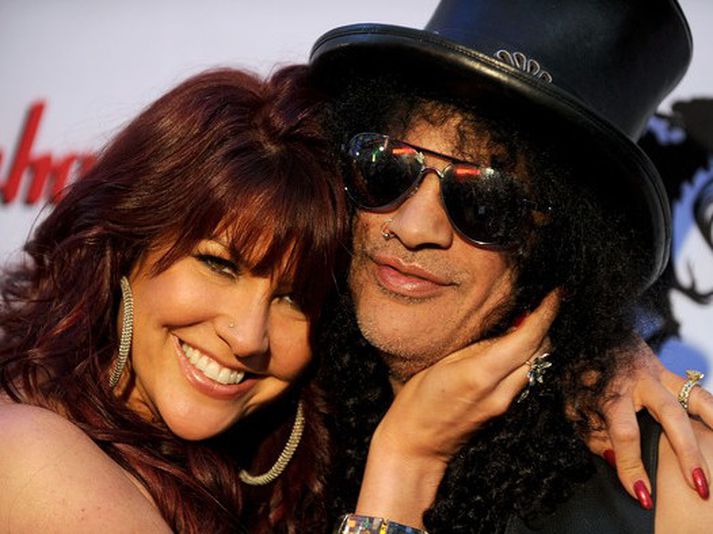 Perla Ferrar og Slash. MYND/Cover Media