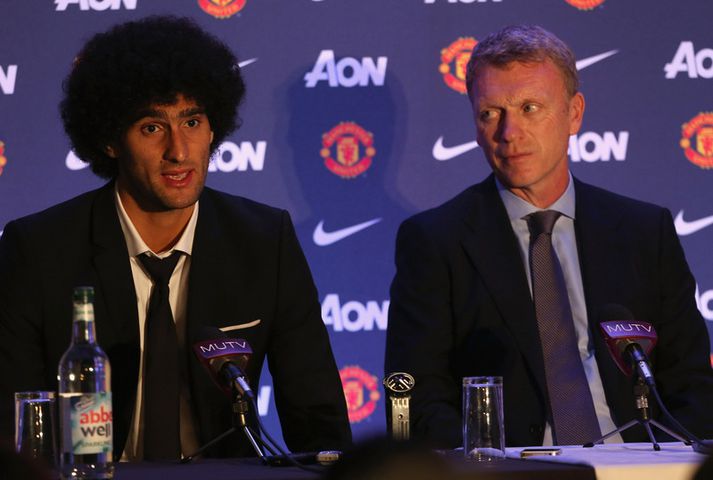 Fellaini og Moyes á blaðamannafundi.
