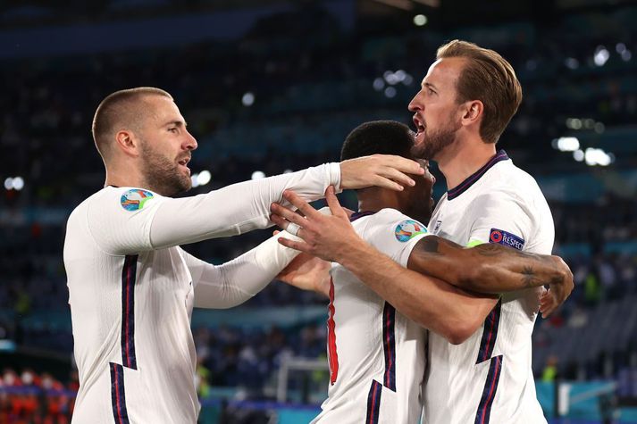 Ukraine v England - UEFA Euro 2020: Quarter-final ROME, ITALY - JULY 03: Harry Kane of England celebrates with Raheem Sterling and Luke Shaw after scoring their side's first goal during the UEFA Euro 2020 Championship Quarter-final match between Ukraine and England at Olimpico Stadium on July 03, 2021 in Rome, Italy. (Photo by Lars Baron/Getty Images)