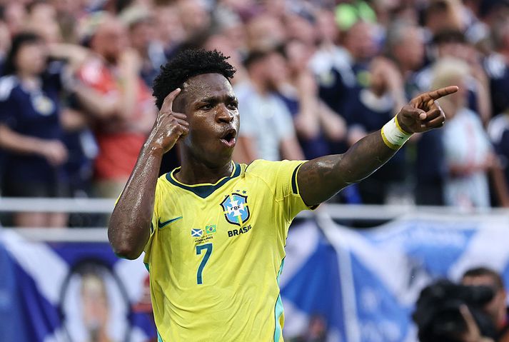 Scotland v Brazil: Group C - FIFA World Cup 2026 MIAMI GARDENS, FLORIDA - JUNE 24: Vinicius Junior #7 of Brazil celebrates scoring his team's second goal during the FIFA World Cup 2026 Group C match between Scotland and Brazil at Miami Stadium on June 24, 2026 in Miami Gardens, Florida. (Photo by Carmen Mandato - FIFA/FIFA via Getty Images)