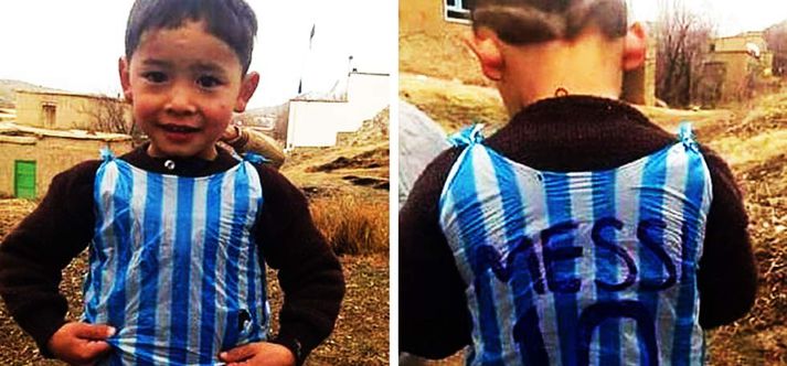 Ahmadi er hér sáttur í plastpokabúningnum. Bráðum fer hann úr sveitinni í Afganistan og á Camp Nou þar sem hann mun hitta Messi sjálfan.