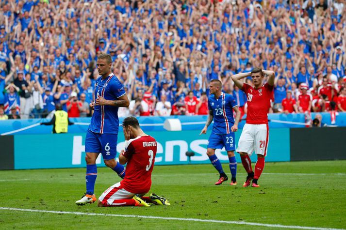 Íslendingar unnu frækinn 2-1 sigur á Austurríki á Stade de France í sumar. Leikurinn var stórskemmtilegur og hádramatískur.