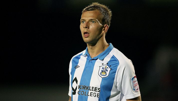 Jordan Rhodes skoraði bæði mörk Huddersfield í dag.