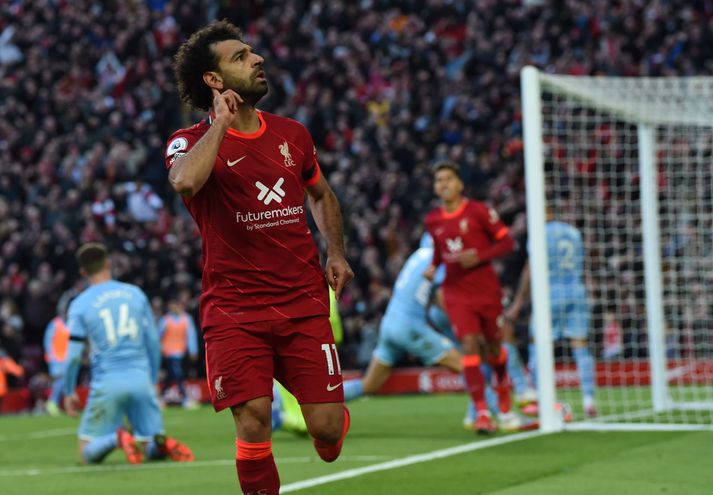 Mohamed Salah fagnar glæsimarki sínu gegn Manchester City.