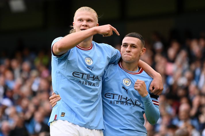 Manchester City v Manchester United - Premier League MANCHESTER, ENGLAND - OCTOBER 02: Phil Foden of Manchester City celebrates their sides sixth goal and their hat trick with team mate Erling Haaland during the Premier League match between Manchester City and Manchester United at Etihad Stadium on October 02, 2022 in Manchester, England. (Photo by Michael Regan/Getty Images)