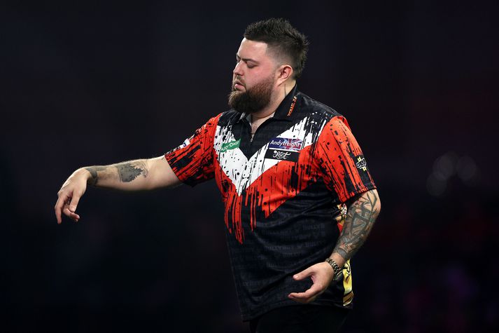 Fyrrverandi heimsmeistarinn Michael Smith er úr leik á HM