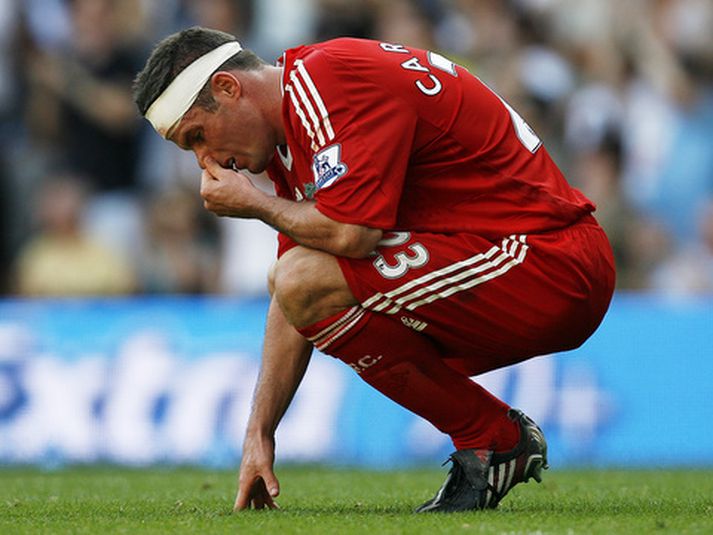 Jamie Carragher fékk að finna fyrir því í tapi Liverpool fyrir Tottenham.
