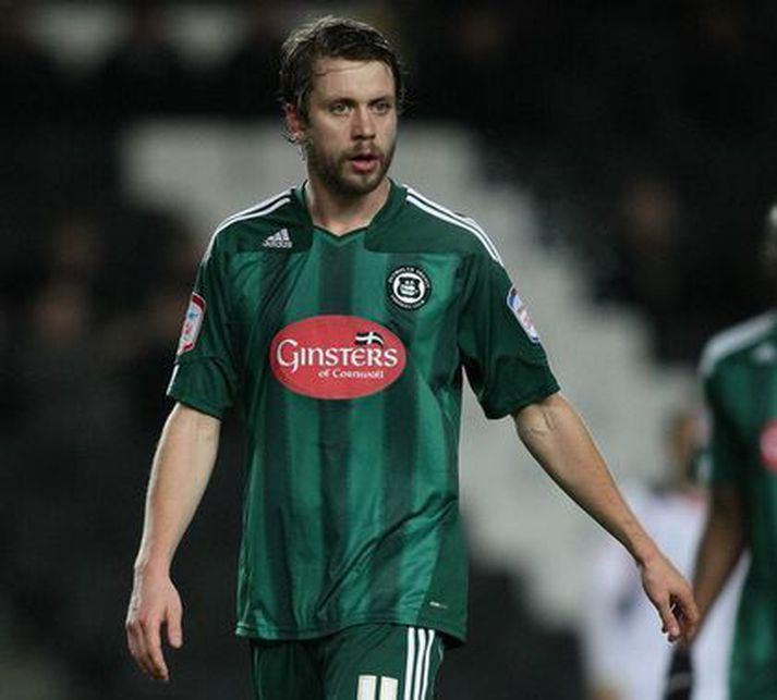 Kári Árnason í leik með Plymouth.