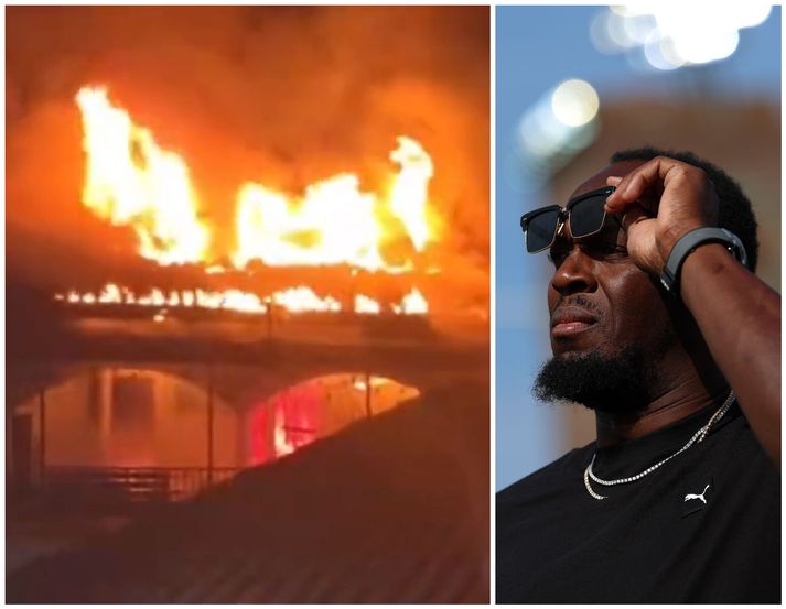 Veitingastaður Usain Bolt í ljósum logum í nótt.