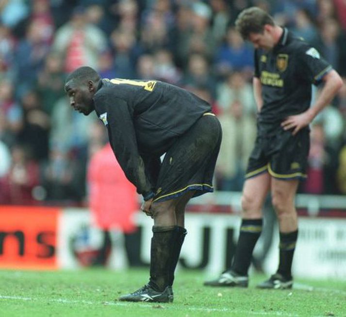 Andy Cole og Gary Pallister eru hér heldur niðurlútir í lok leiks United og West Ham vorið 1995.