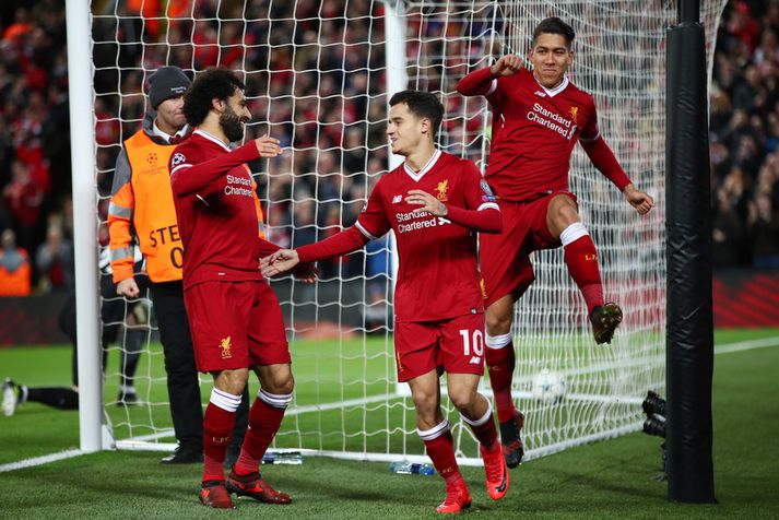 Philippe Coutinho fagnar marki með Salah og Firmino.