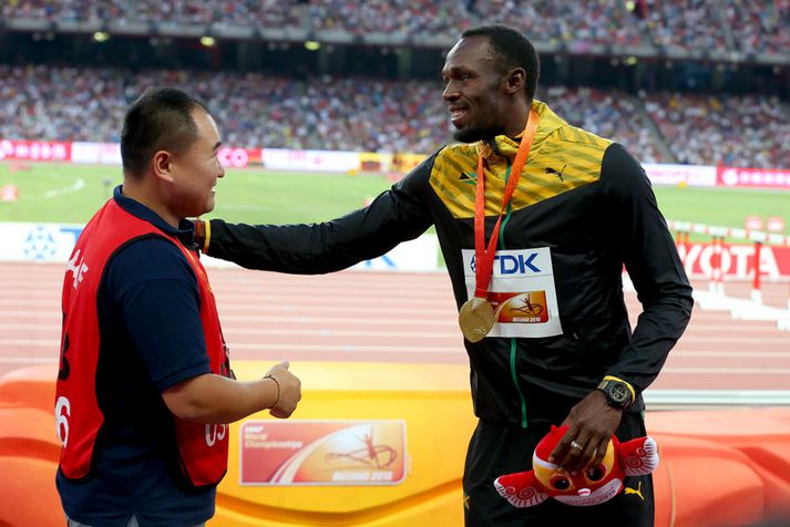 Song Tao og Usain Bolt.
