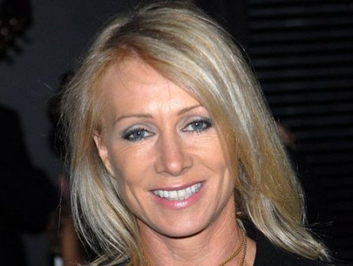 Tískumógúllinn Karen Millen. Spurt er hvort hún eigi raunverulega stofnfjárbréfin.