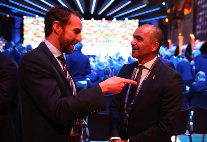 Gareth Southgate og Roberto Martínez, þjálfarar Englands og Belgíu, léttir í bragði eftir að dregið var í riðla Þjóðadeildarinnar í dag.