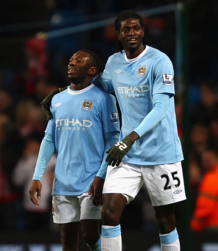 Adebayor fagnar með Wright-Phillips.